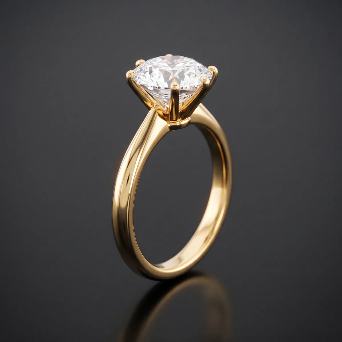 Aurelia Solitaire — Brilliant-cut solitaire, six-prong, 18k yellow gold.