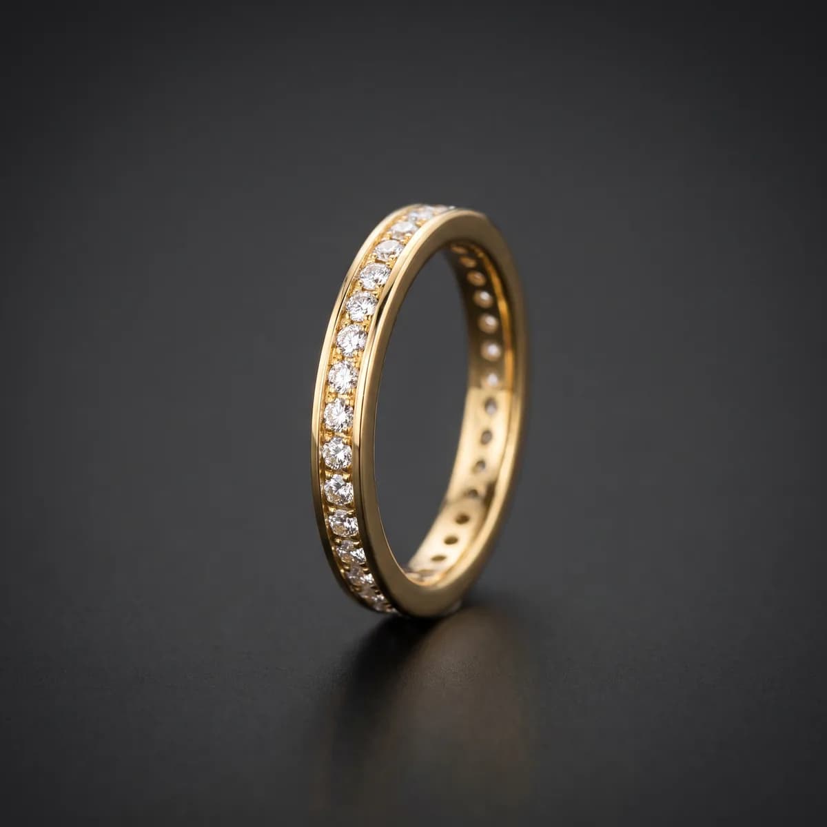 Noor Eternity — Full eternity band, channel-set, 18k yellow gold.